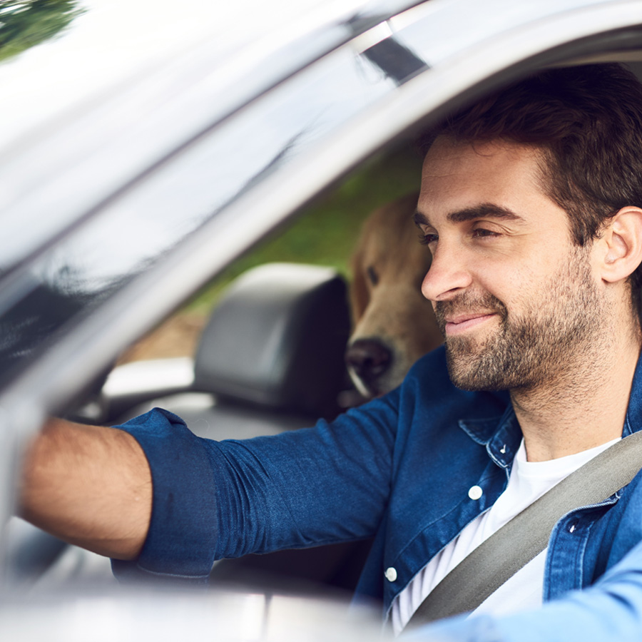 guy driving car.